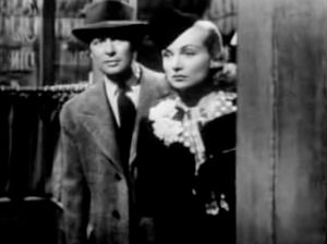 데이비드 스미스 역의 로버트 몽고메리와 앤 스미스 역의 캐럴 롬바드