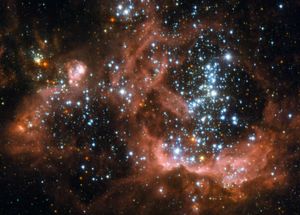 NGC 604, 허블 우주 망원경이 촬영한 삼각형자리 은하 내부에 있는 항성 생성 영역.