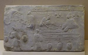 한나라 무덤 벽돌에 묘사된 손수레