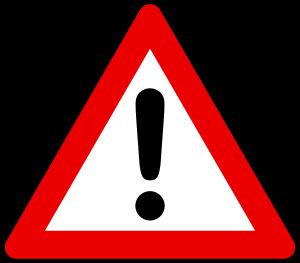 위험을 알리는 느낌표가 있는 경고 표지판.