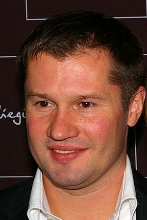 웃는 알렉세이 네모프의 상반신 사진