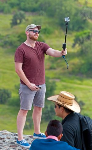 셀카봉을 사용한 셀프 촬영