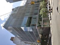 AJ 헤셸 학교 건물 (뉴욕시 웨스트엔드 애비뉴 30번가); 학교의 인접 건물 (웨스트엔드 애비뉴 20번가)이 오른쪽 부분에 보임