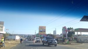 소시안 초등학교 근처 엘도레트에서 차량이 떠나는 모습.