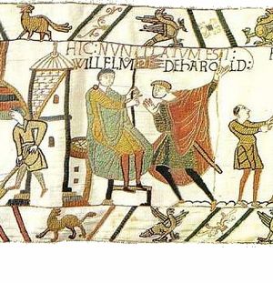 바이에 시의 태피스트리: 정복왕 윌리엄은 교황 알렉산데르 2세가 보낸 선물인 금색 십자가가 있는 교황 곤팔론을 들고 있다.