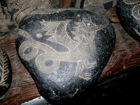 이카의 돌 중 용같은 동물을 묘사한 그림.