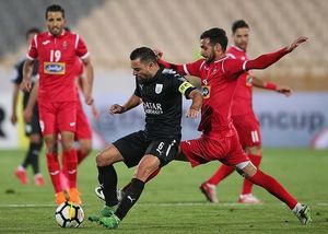 페르세폴리스와 알사드의 경기에서 사비와 아흐마드 누롤라히.