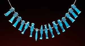 제드, 와지, 그리고 신의 형상; 이집트 파이앙스로 만든 부적.