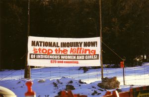 2014년 3월 4일 온타리오주 타이딘가 모호크 영토에서 열린 시위에서 보여진 표지판