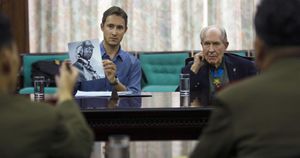 아담 마코스 작가와 톰 허드너가 브라운 유해 반환을 위해 북한 관리들과 협상하고 있다.