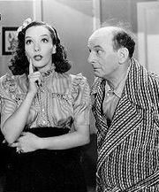 영화 《멕시칸 스핏파이어》(1940)에서 레온 에롤과 함께 있는 베일레스