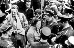 촬영을 두고 나치 당 간부와 언쟁을 벌이는 레니 리펜슈탈