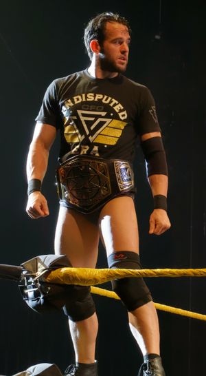 스트롱은 WWE의 NXT 브랜드에서 언디스퓨티드 에라의 멤버로서 두 번의 NXT 태그팀 챔피언십 챔피언이다.