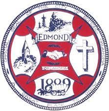 1965년부터 1996년까지 사용된 구 시(市)의 문장(紋章), 오른쪽 사분면에 십자가가 있음