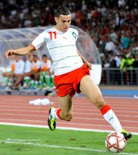 2011년 알제리와의 경기에서 모로코 대표팀 소속으로 뛰고 있는 아사이디