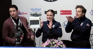 2022 MK 존 윌슨 트로피에서 모이어(맨 왼쪽)와 제자들인 크리스티나 카레이라와 앤서니 포노마렌코