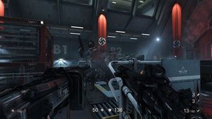 이 게임플레이 스크린샷에서, 주인공 윌리엄 "B.J." 블라즈코비츠는 두 개의 무기를 양손으로 들고 있다. 헤드업 디스플레이는 B.J.의 체력과 방어구를 보여준다.