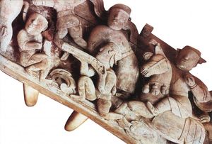 17세기 베트남 나무 부조, 무릎을 꿇은 아케부스병을 보여준다.