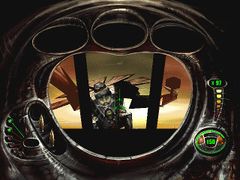 MDK의 저격 모드. 탄환 선택은 왼쪽에 있고, 체력은 오른쪽에 있는 원으로 표시된다. 체력 미터 위에는 저격 무기의 현재 확대/축소 비율이 있다. 세 개의 "탄환 캠"이 화면 상단에 있다.