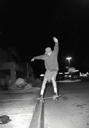 톰 델론지, 이 곡의 주요 작사가, 1990년대 초 모습.