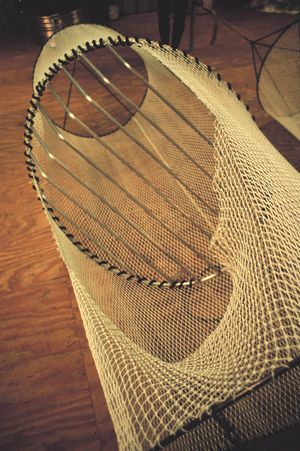 상업용 TED의 예시. 금속 격자와 탈출구가 보인다.