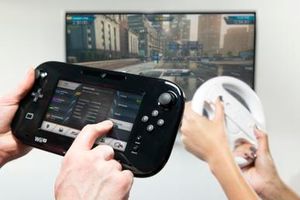 Wii U 전용 협동 "Co-Driver" 게임 모드 실행 모습. 한 명의 플레이어는 Wii 리모컨(Wii 휠과 함께)으로 운전하고 다른 한 명은 Wii U GamePad를 사용하여 지원을 제공한다.