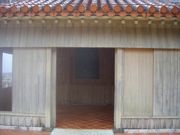 오늘날 종의 복제품이 있는 슈리성 부지에 재건된 토모야