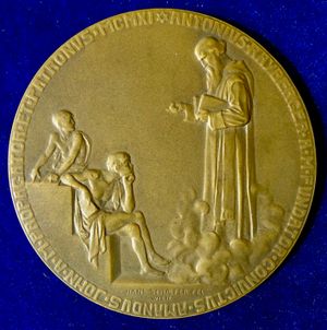 한스 셰퍼가 제작한 메달 뒷면. 성 베네딕토가 가르치는 모습이다.