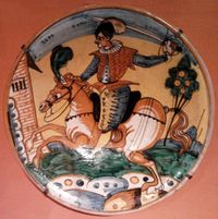 로얄 캐슬에 소장된 17세기 초 몬텔루포 도자기의 예시인 기마상이 그려진 아를레키노 스타일 접시