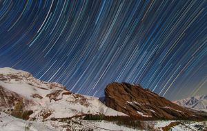 Star trail over the rocky mountain in Alamut, Qazvin, Iran