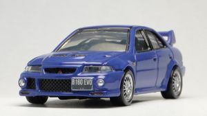 토미카(TOMICA)의 1:64 스케일 미쓰비시 랜서 에볼루션 VI 다이캐스트 모델