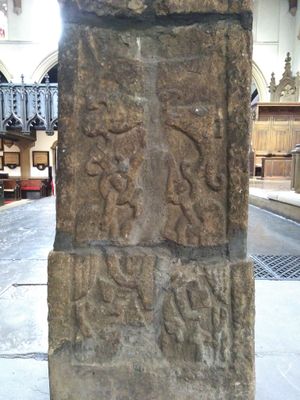 c. 10세기 경에 리즈 민스터에서 발견된 리즈 십자가의 패널 Civ(남쪽 면, 가장 낮은 패널)로, 볼룬드(아래)가 베두힐드/보드빌드를 머리 위로 직각으로 들고 있는 모습이 묘사되어 있다. 볼룬드의 머리는 없어졌지만, 그의 날개는 왼쪽과 오른쪽에 보이며, 그의 도구는 패널 하단에 있다.