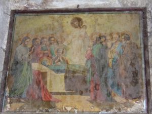 벽에 있는 오래된 종교 그림