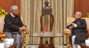 틴 쪼와 프라나브 무케르지 (뉴델리)