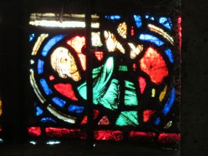 수난의 창의 세부 묘사; 정육점 주인, 창의 후원자, 작업 중 (13세기)