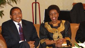 자카야 키크웨테 대통령과 함께 있는 미기로